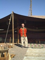 Colin standing in his Embassy shirt